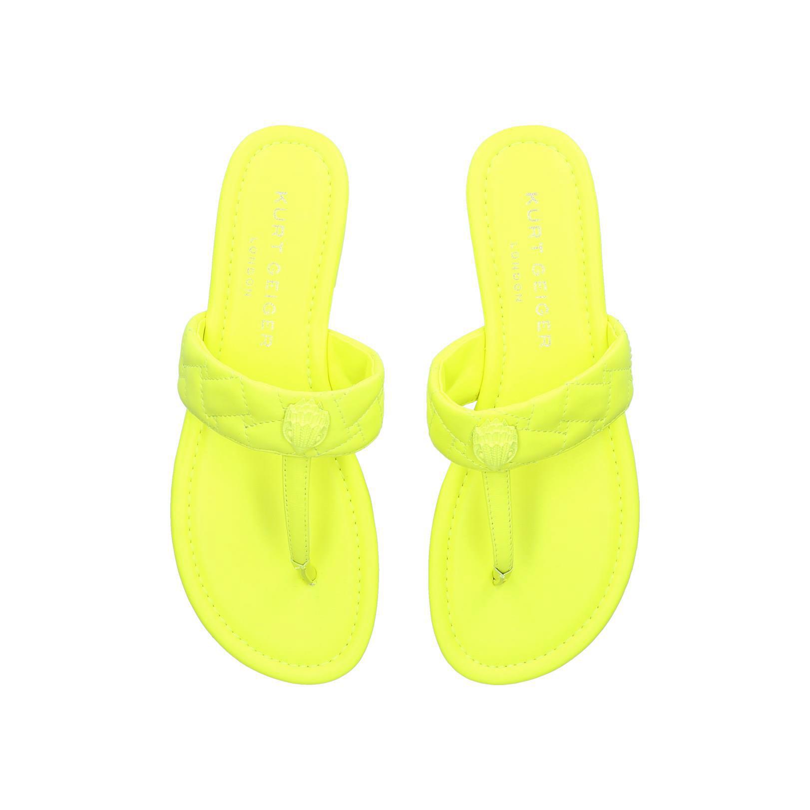 neon yellow flip flops