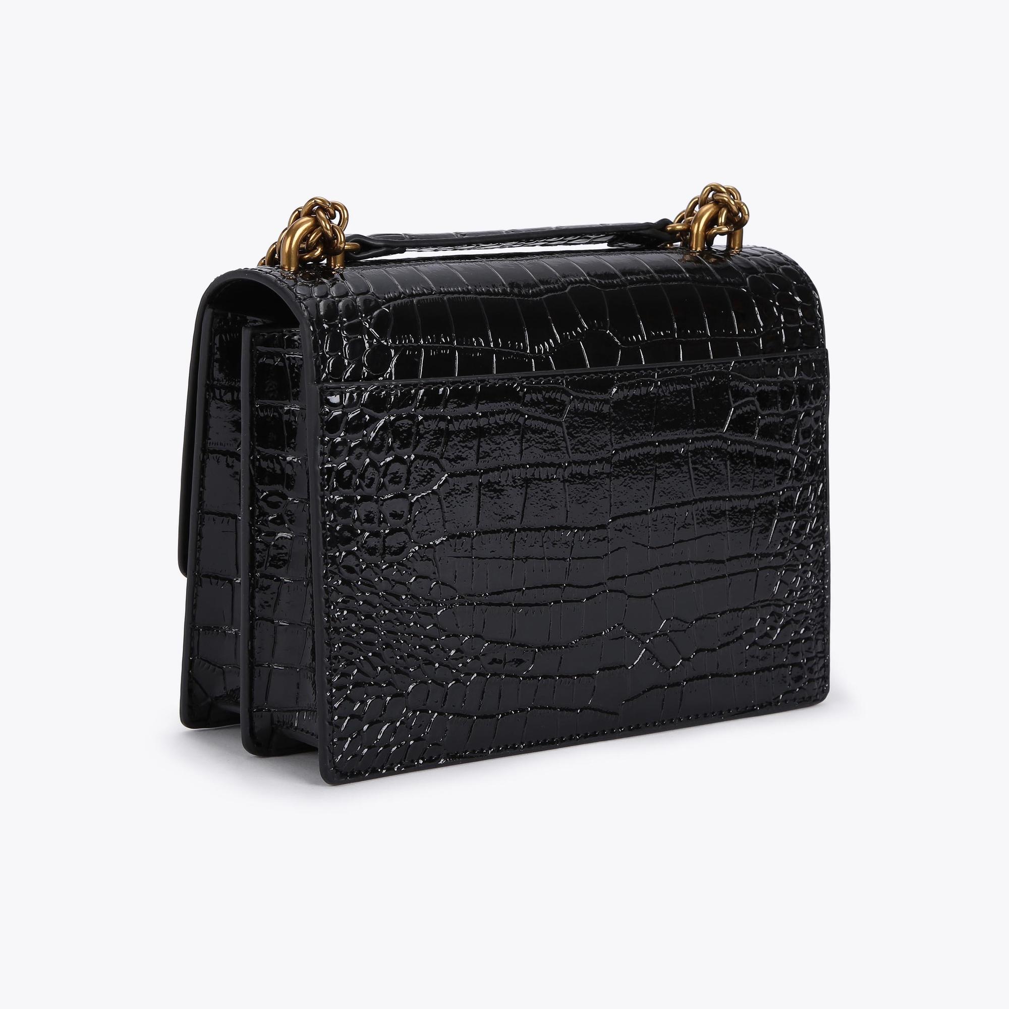 Leather crossbody bag with all-over embossed eagle