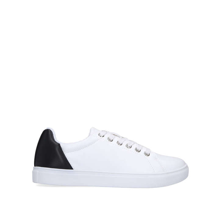white sneakers with black heel