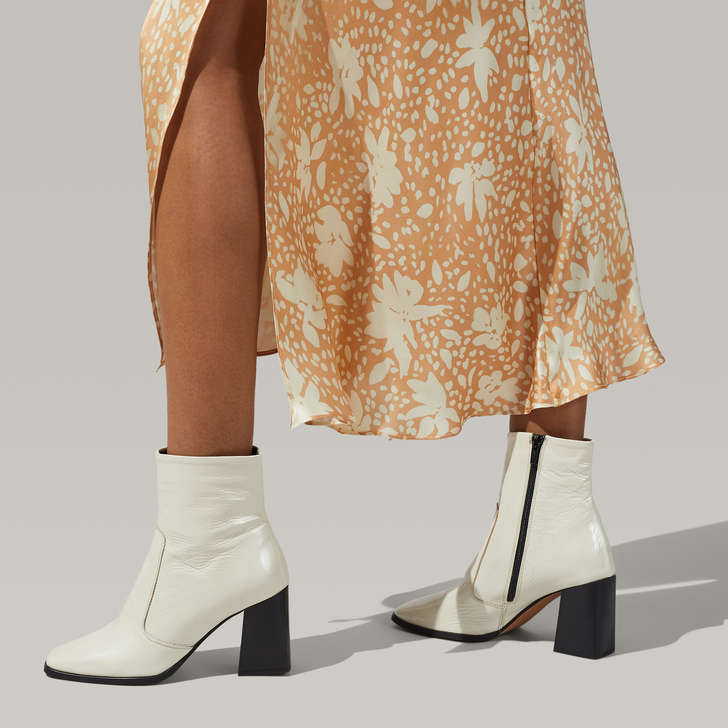 cream patent ankle boots